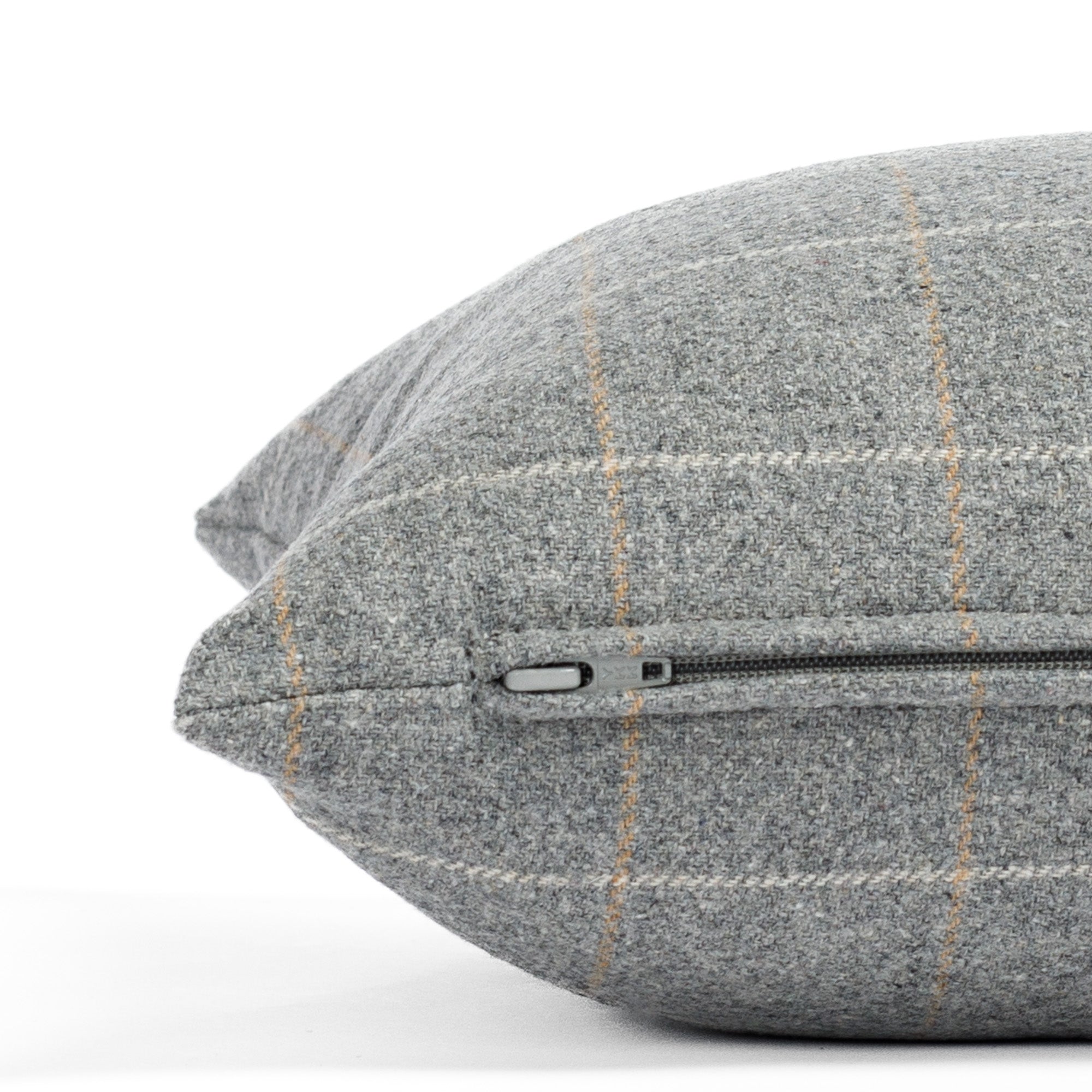 a heather gray windowpane check lumbar pillow: close up zipper view