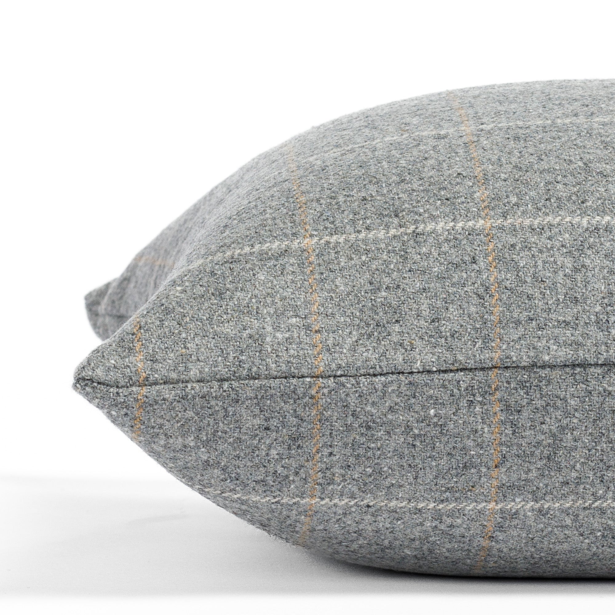 a heather gray windowpane check lumbar pillow: close up side view