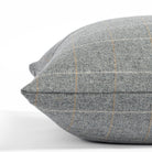 a heather grey windowpane check throw pillow: close up side view