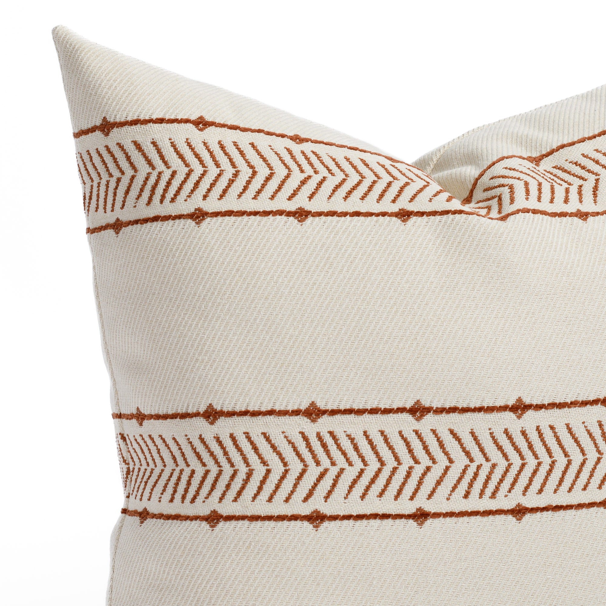 a cream and rusty red patterned stripe throw pillow : close up view