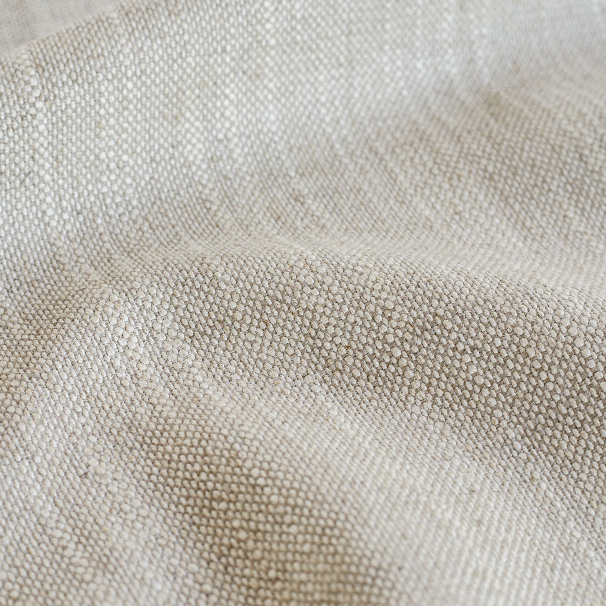 a linen blend stain resistant upholstery fabric: close up view