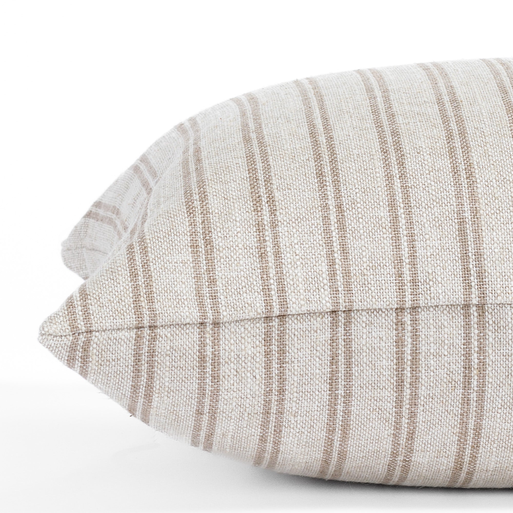 a cream and brown stripe extra long lumbar pillow : close up side view