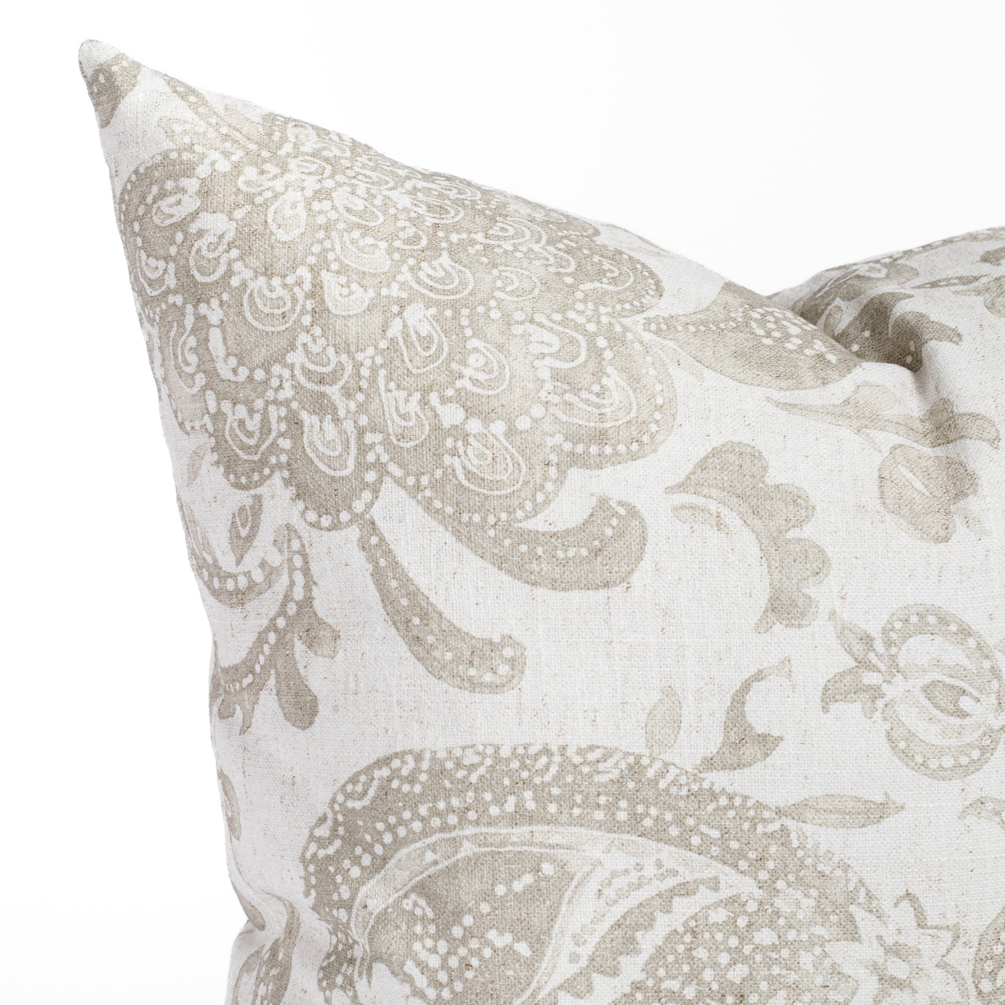 an earthy grey floral print pillow : close up view