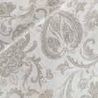 an oatmeal and earthy gray floral print multipurpose fabric