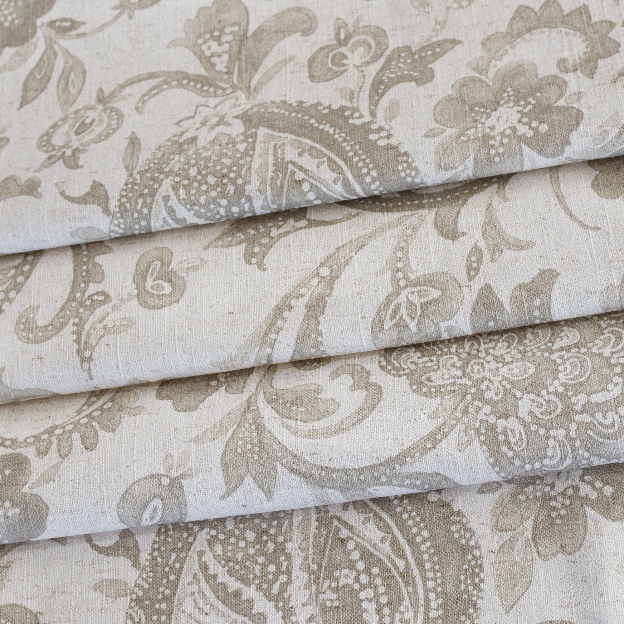 an oatmeal and earthy gray floral print multi purpose fabric from Tonic Living