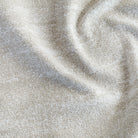 a cream textured stain resistant upholstery fabric