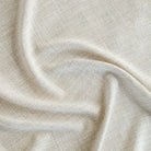 a semi sheer wheat toned double width fabric