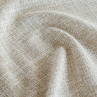 a semi sheer wheat toned double width fabric - close up view