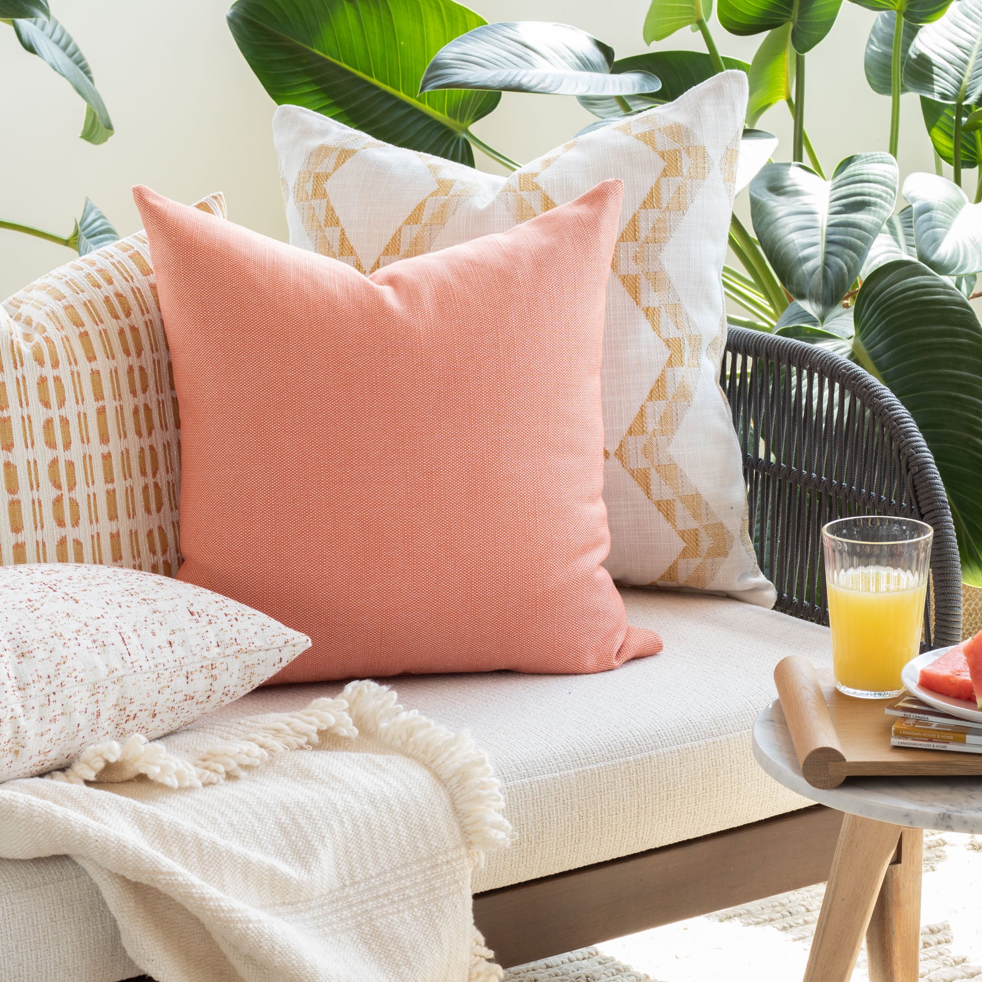 coral, yellow and white indoor outdoor pillows