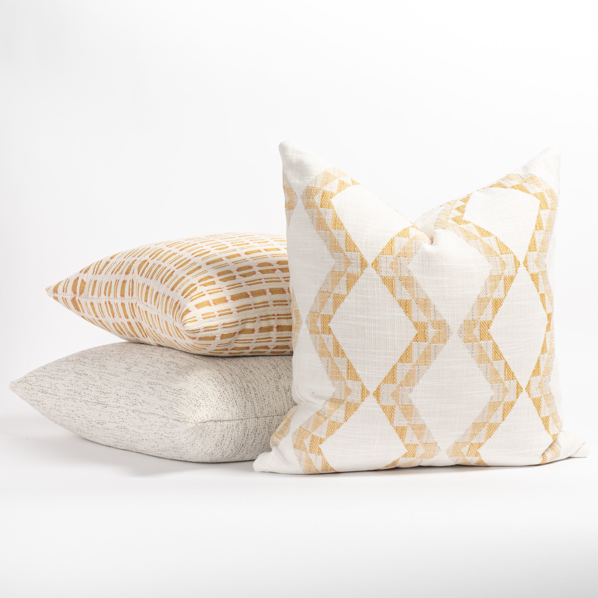 modern yellow and cream patterned indoor outdoor pillows 
